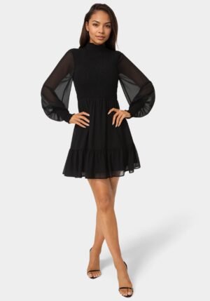bebe2152_black_1_73d71738-2556-40fc-a8f4-a436f537af16 Long Sleeve Mock Neck Chifon Smocked Mini Dress